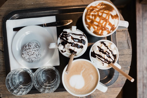 selection of hot drinks on a tray in a cafe in Norrtälje, Stockholm County, Sweden