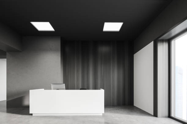 istock Reception in grey and wooden panoramic office 1268301824