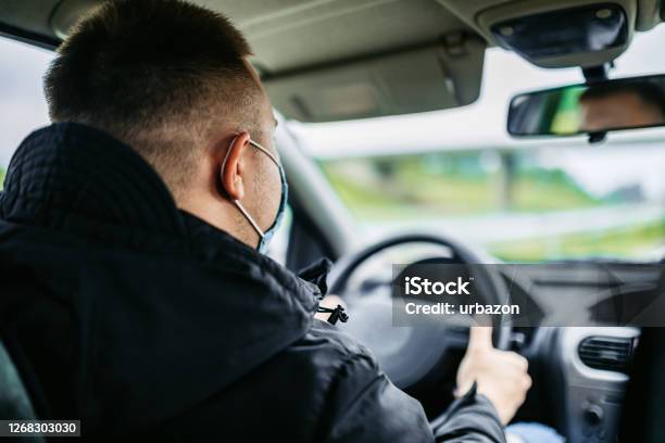 Man Driving Car With Mask Stock Photo - Download Image Now - Taxi Driver, Coronavirus, COVID-19