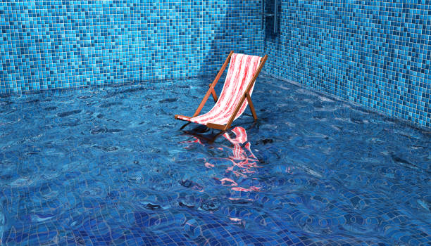 istock Swimming pool and sunbed 1268303237