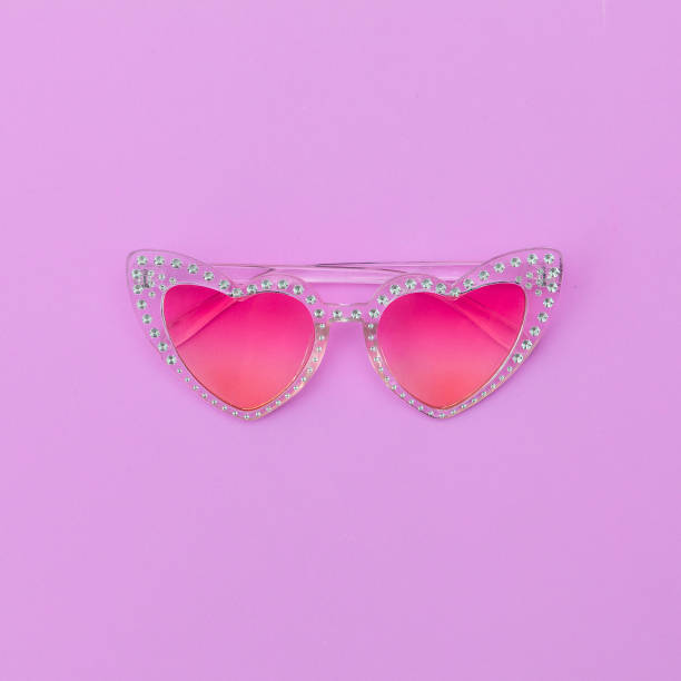 istock Trendy retro sunglasses hearts. Stylish accessory. Flat lay 1268304039