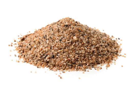 A pile of dry beach sand. Sand dune isolated on white background. Clipping path