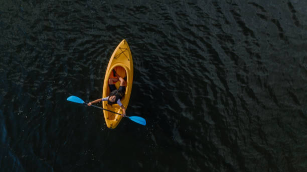 istock Woman kayaking on the lake 1268304567