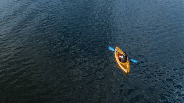 istock Woman kayaking on the lake 1268304585