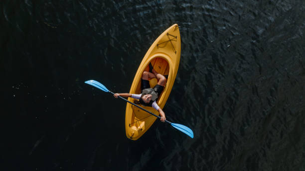 istock Woman kayaking on the lake 1268304600