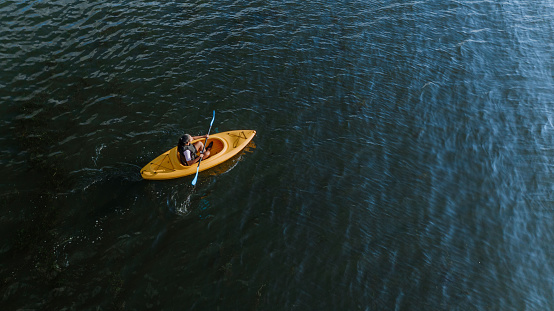 Woman kayaking on the lake