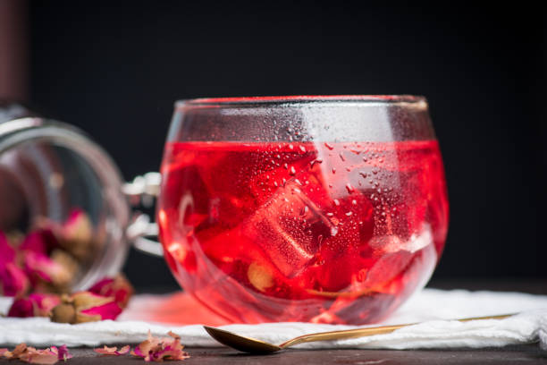 istock Rose Ice tea with natural rose flowers in a cup 1268304640