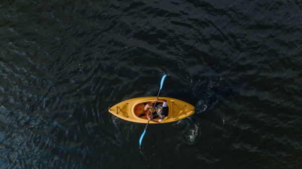 istock Woman kayaking on the lake 1268304648