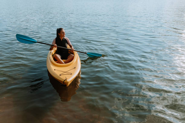 istock Woman kayaking on the lake 1268304684