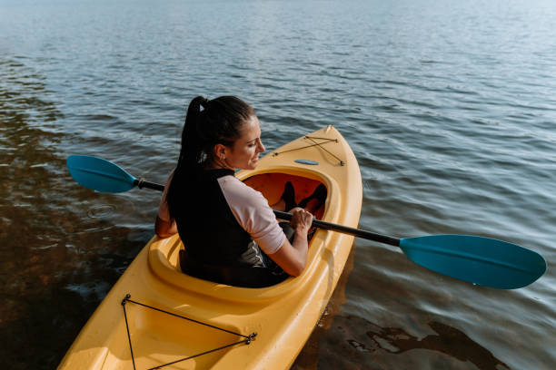 istock Woman kayaking on the lake 1268304714