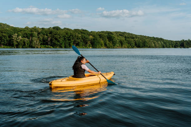 istock Woman kayaking on the lake 1268304720