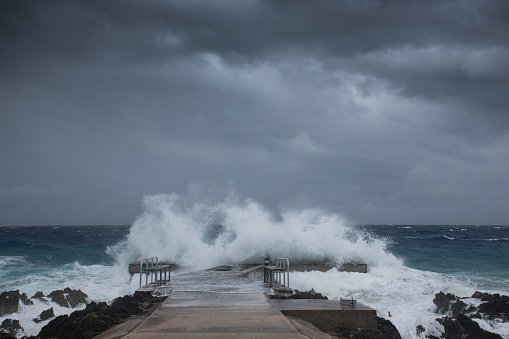 A shot of a dock in Grand Cayman as Hurricane Laura passes by