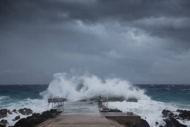 Hurricane Laura A shot of a dock in Grand Cayman as Hurricane Laura passes by tropical storm photos stock pictures, royalty-free photos & images
