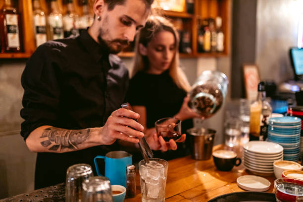 istock Baristas packing coffee 1268305395