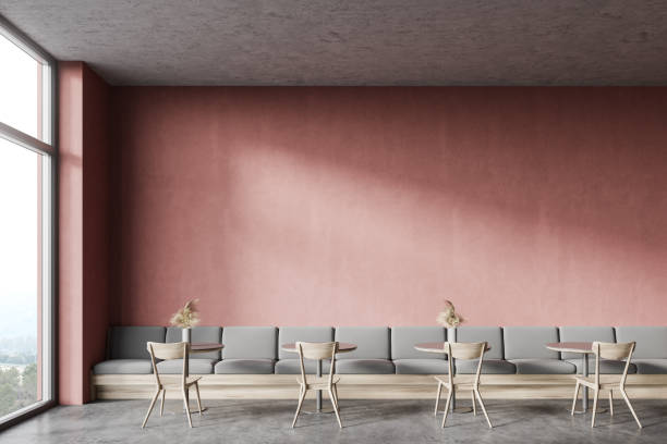 istock Pink coffee shop interior with sofa 1268305753
