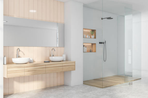 istock Grey and beige bathroom corner, sink and shower 1268306073