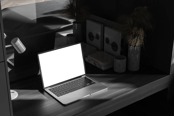istock Mock up laptop in grey bedroom corner 1268307123