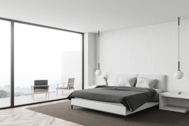 istock White bedroom corner with balcony 1268307393
