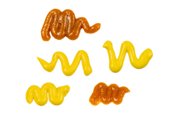 istock Yellow cheese sauce splashes isolated on white background. 1268317237