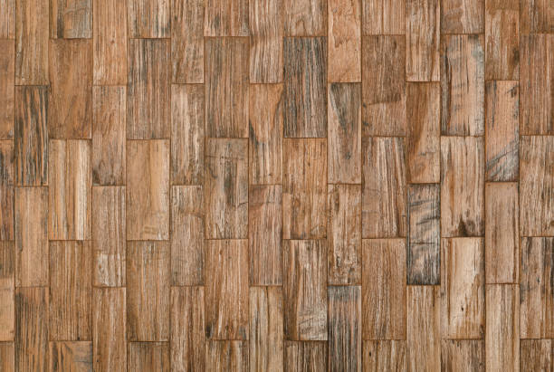 istock background and texture of brown color decorative old wood on surface wall in rectangular shape. 1268324775