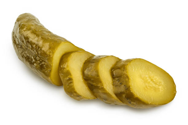 istock Marinated pickled cucumber isolated on white background with clipping path and full depth of field 1268335609