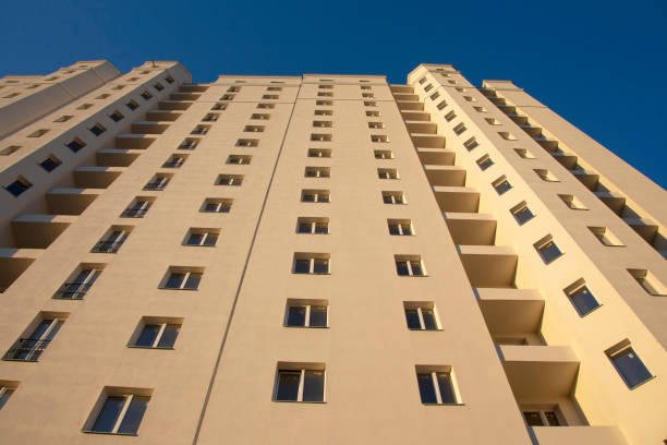 istock Facade of a new multi-story residential building. architecture and modern construction 1268339745