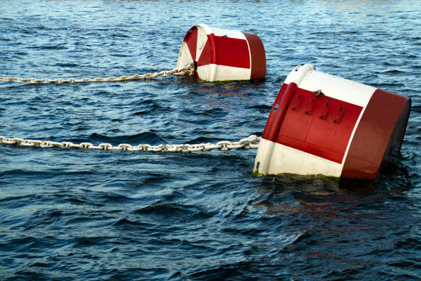istock large sea buoys with chains on the waves in daylight 1268339977