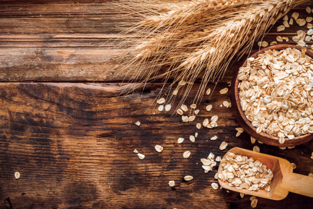 istock Oat flakes on  wooden 1268340587