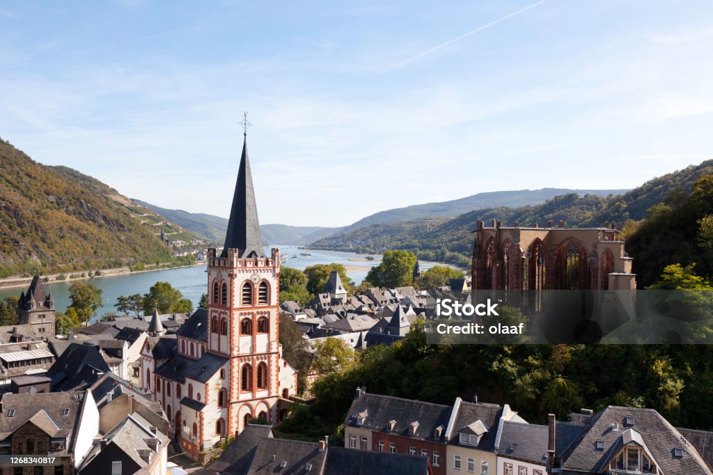 Bacharach View of the city with church of St. Peter and ruins of the Werner Chapel. In the background Rhine Valley panorama. Bacharach Stock Photo