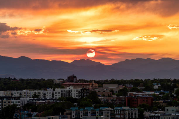 istock Colorful sunset over Denver 1268346175