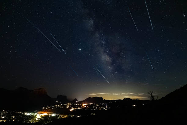 Meteor shower over Sedona, Arizona Perseids meteor shower over the red rocks of Sedona, Arizona. meteor shower stock pictures, royalty-free photos & images