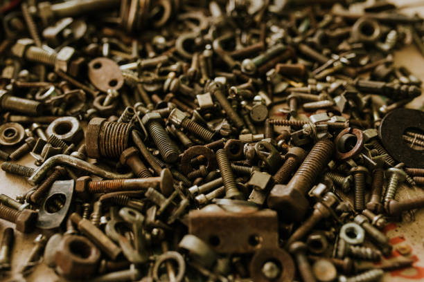 istock Various old metal iron nuts bolts nails wrenches 1268354327
