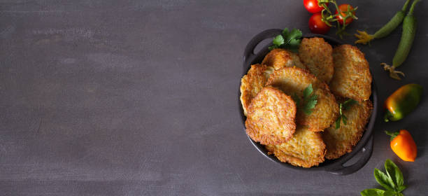 Potato Cakes. Vegetable fritters, latkes, draniki. Vegetable pancakes Potato Cakes. Vegetable fritters, latkes, draniki. Vegetable pancakes. View from above, top studio shot, copy space cake models stock pictures, royalty-free photos & images