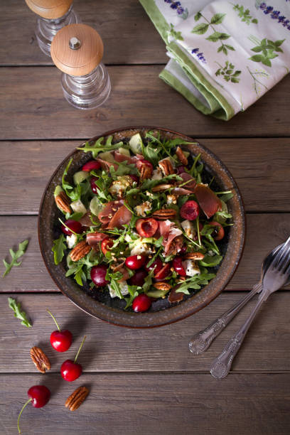 istock Strawberry and prosciutto salad with gorgonzola cheese and arugula 1268355990