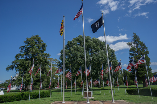 Charlotte Hall, MD, USA, August 23, 2020: Flags of the United States, the State of Maryland, and POW MIA at Charlotte Hall Veterans Home.