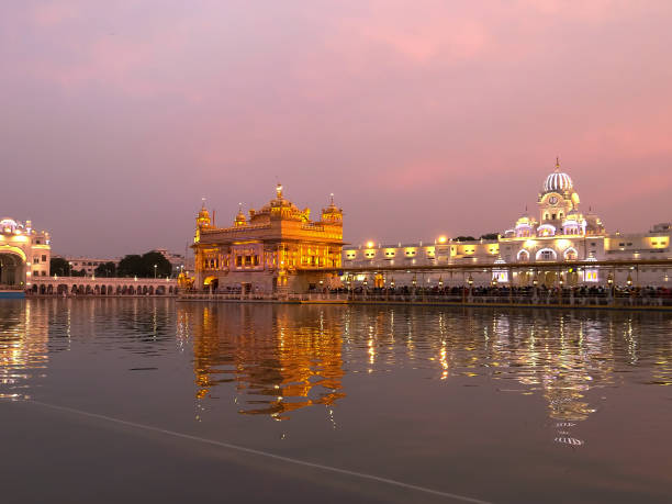istock golden temple with pink sunset sky in amritsar 1268362502