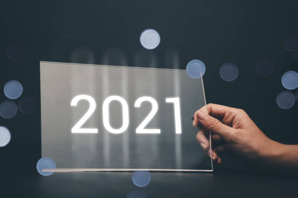 istock Digital Composite Image Of Human Hand Touching Numbers On Screen 1268369660