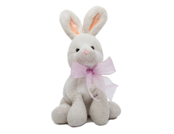 istock White teddy rabbit, soft toy in child's on white background. 1268372865