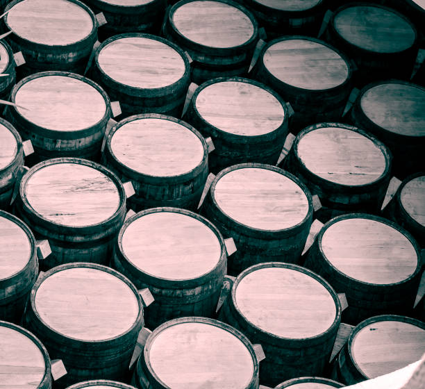istock Wine barrels stacked in the old cellar of the winery. 1268374082