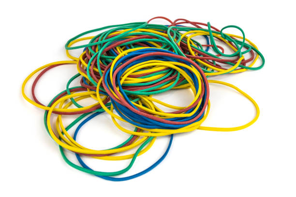 istock A pile of multi-colored rubber bands for money on a white background, isolated 1268381498