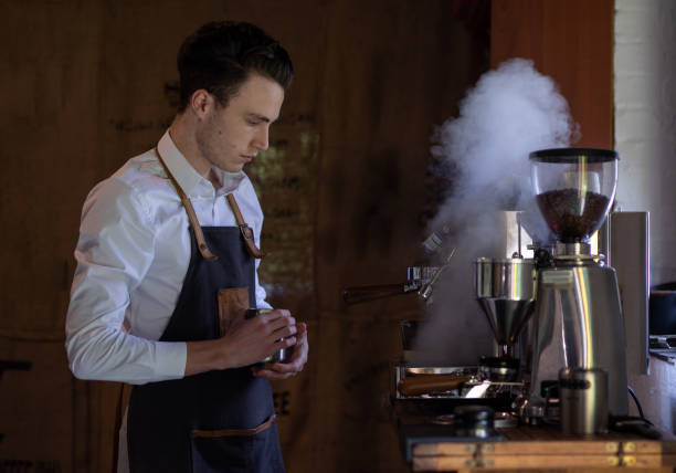 istock A barista busy making coffee 1268386785