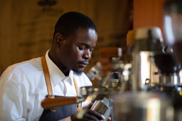 istock A barista busy making coffee 1268387597