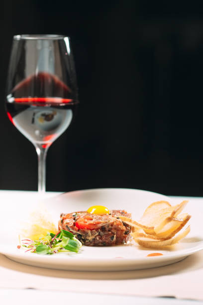 istock Tartar dish in the restaurant on the white plate. 1268389308