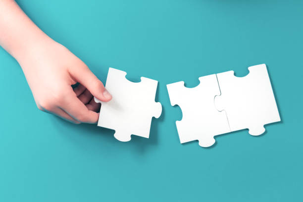 istock jigsaw puzzle piece in a hand 1268390589