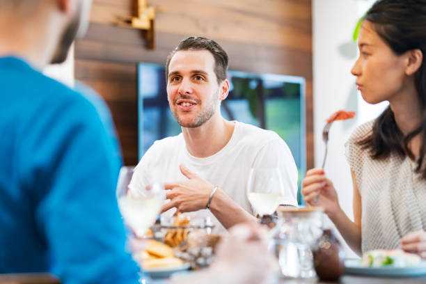 istock Men and women having a house party 1268393553