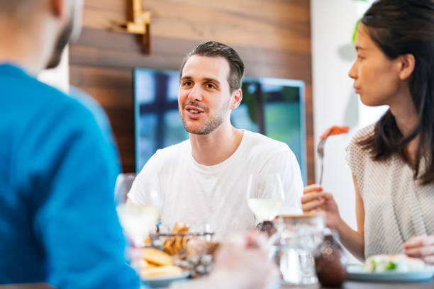 istock Men and women having a house party 1268393733