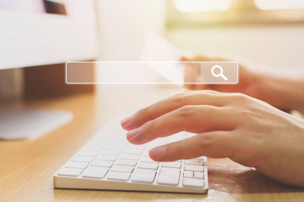 istock Searching information data on internet networking concept. Hand of male typing text on laptop keyboard 1268395468