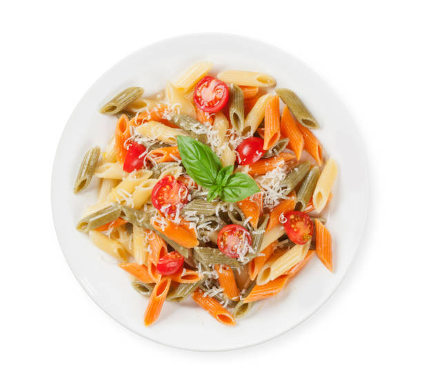 istock Colorful penne pasta with tomatoes and basil 1268397741