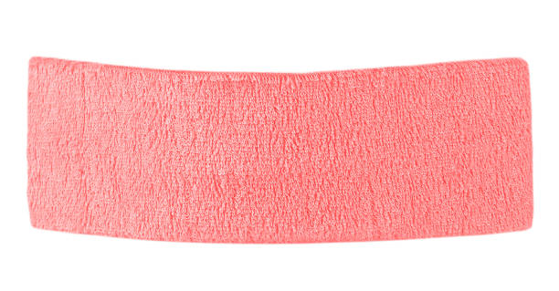 Pink training headband isolated on a white background. Sport headband. Pink training headband isolated on a white background. Sport headband. sweat band stock pictures, royalty-free photos & images