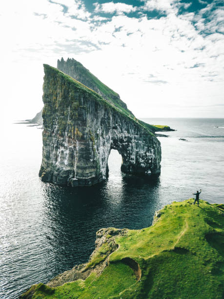 istock hiking man at the faroe islands 1268398415